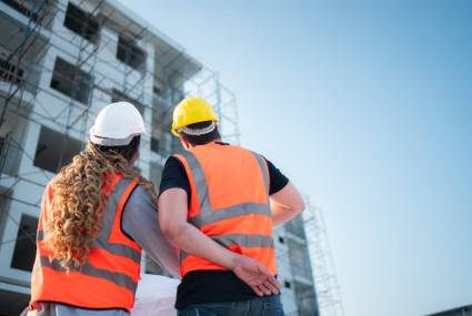 Portrait of architect and engineer with experience in multi-stor Portrait of architect and engineer with experience in multi-story building construction